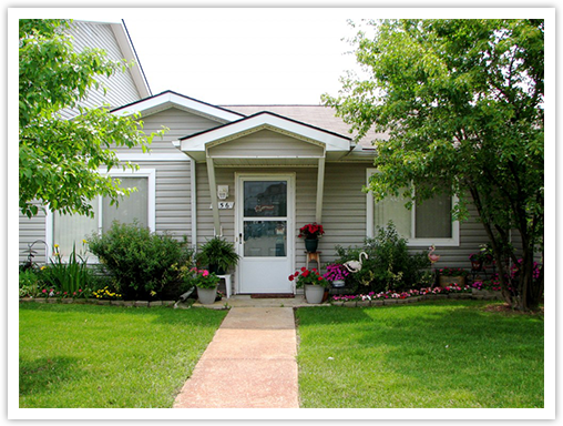 Image of the front yard of a suburban ranch style house